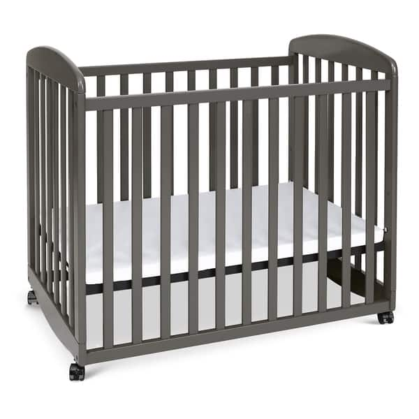 slide 2 of 24, DaVinci Alpha Mini Rocking Crib