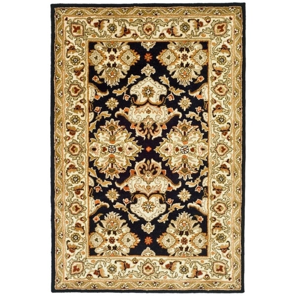 Safavieh Handmade Heritage Timeless Traditional Black/ Ivory Wool Rug - 4' x 6'