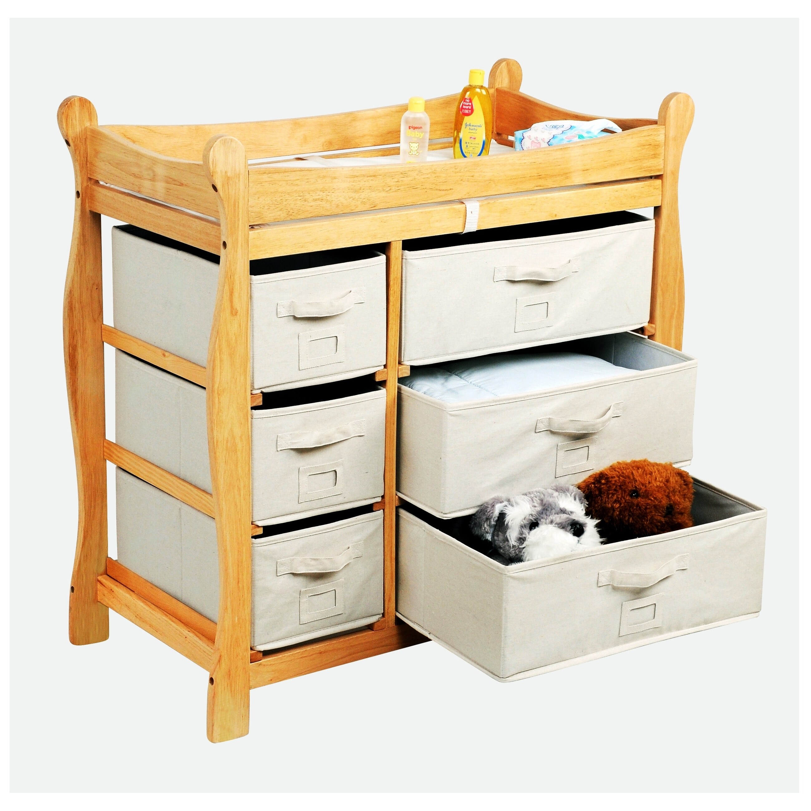 sleigh style baby changing table with 6 storage baskets and pad