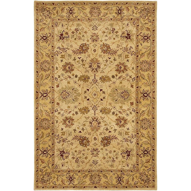 Hand tufted Mandara Ivory Oriental Wool Rug (79 X 106)