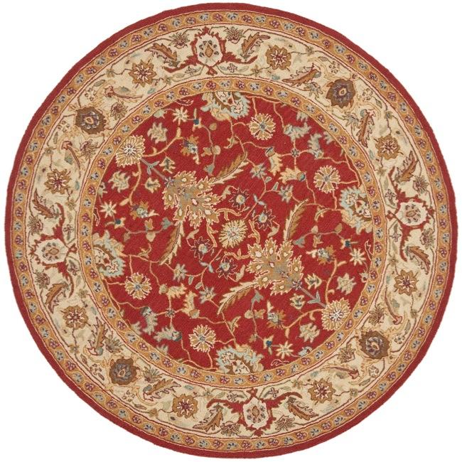 Hand hooked Tabriz Rust/ Ivory Wool Rug (56 Round)