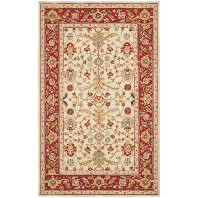 Hand hooked Tabriz Ivory/ Red Wool Rug (39 X 59)