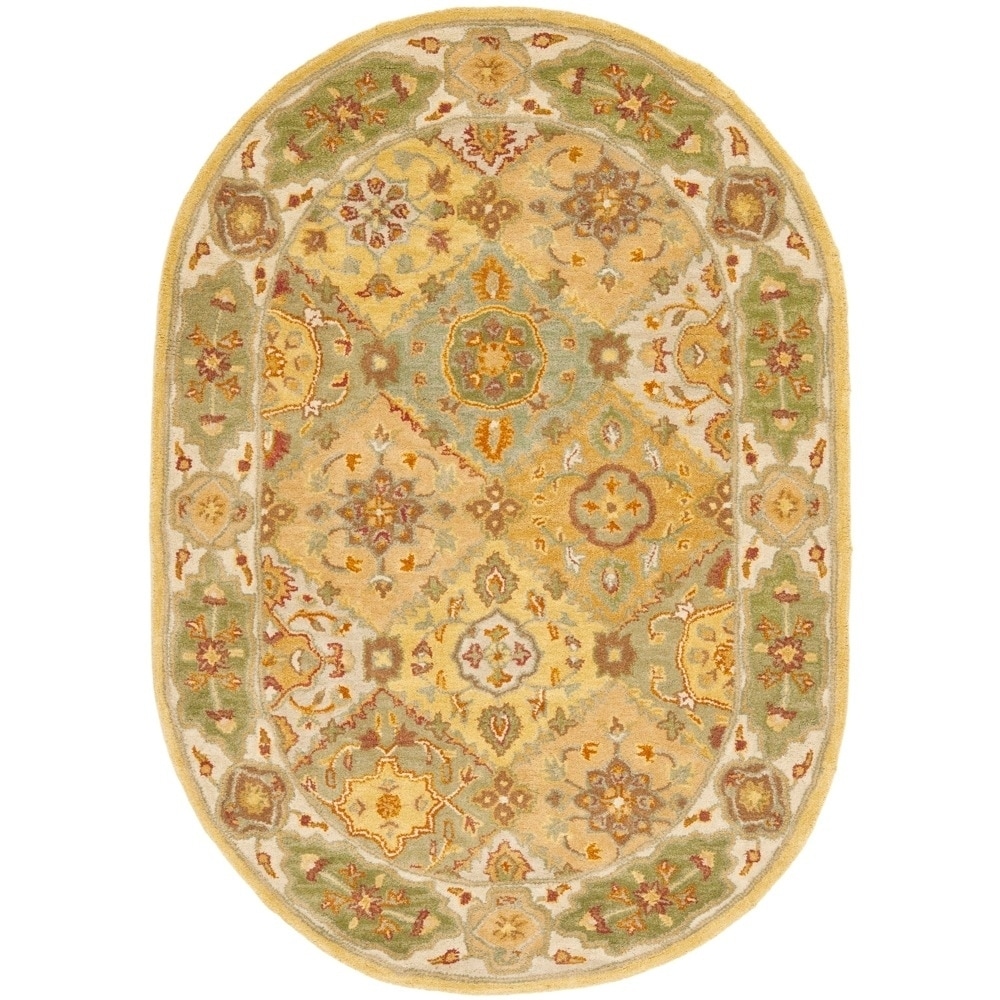 Handmade Bakhtiari Multi/ Ivory Wool Rug (46 X 66 Oval)