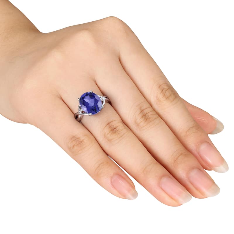 Miadora Sterling Silver Oval-Cut Created Blue Sapphire and Diamond Accent Crossover Ring
