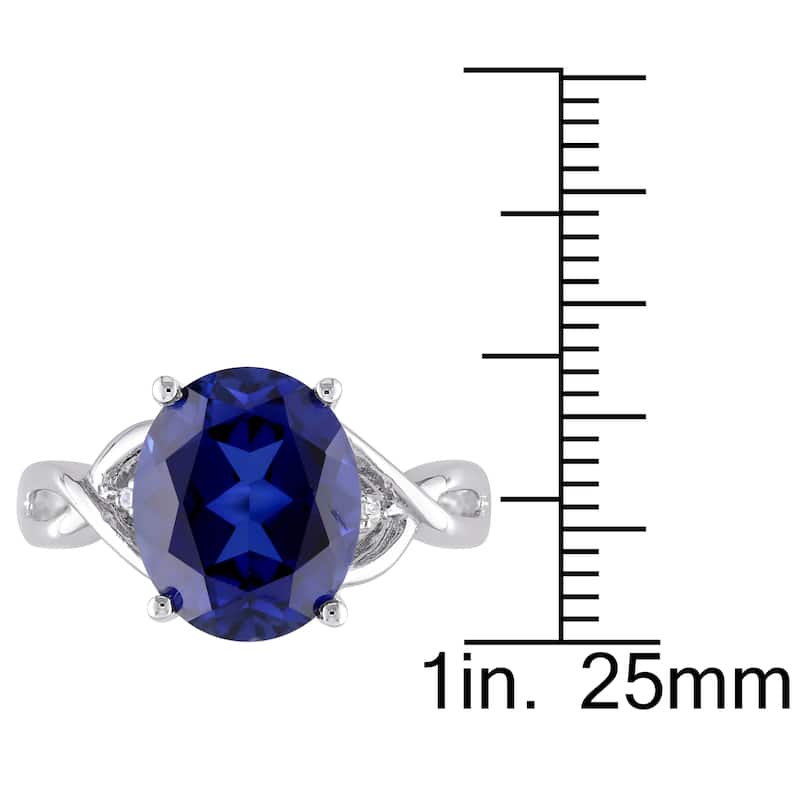Miadora Sterling Silver Oval-Cut Created Blue Sapphire and Diamond Accent Crossover Ring