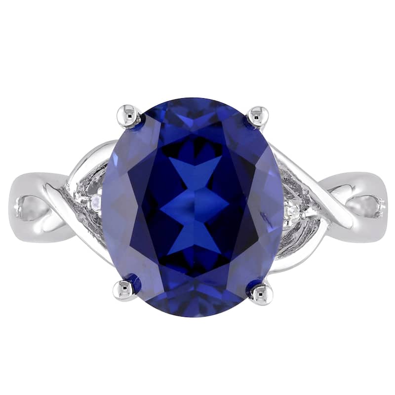 Miadora Sterling Silver Oval-Cut Created Blue Sapphire and Diamond Accent Crossover Ring