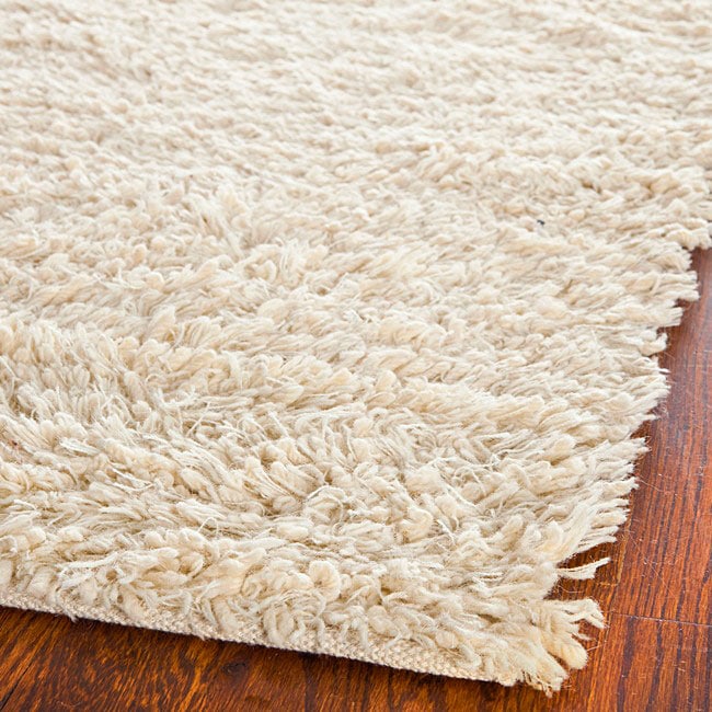 Hand woven Posh Ivory Wool Shag Rug (23 X 8)