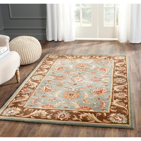 Safavieh Handmade Heritage Timeless Traditional Blue/ Brown Wool Area Rug - 7'6' x 9'6'