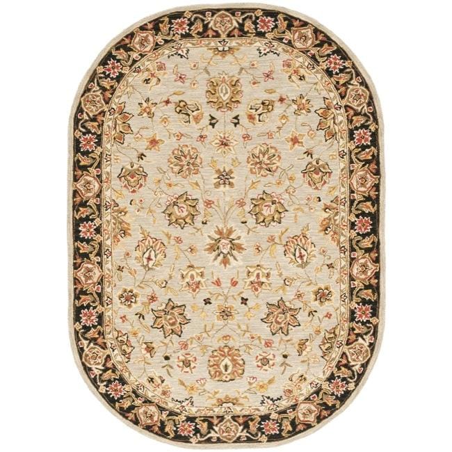 Hand hooked Mirco Kerman Light Blue Wool Rug (76 X 96 Oval)