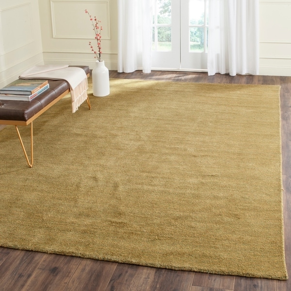 Safavieh Handmade Himalaya Solid Green Wool Area Rug - 5' x 8'