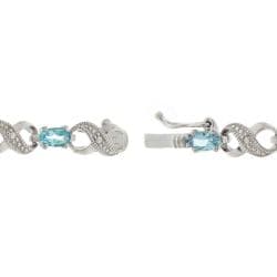 Glitzy Rocks Silver Swiss Blue Topaz and Diamond Accent Bracelet Glitzy Rocks Gemstone Bracelets