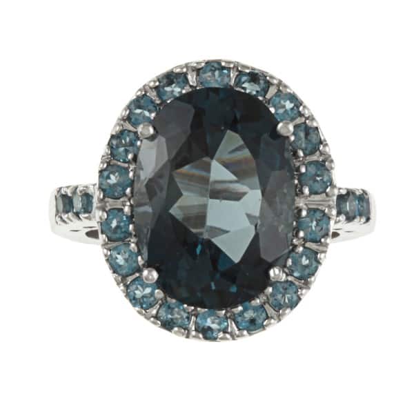 Oval London Blue Topaz Ring surrounded by Crystals Ring Size 7.