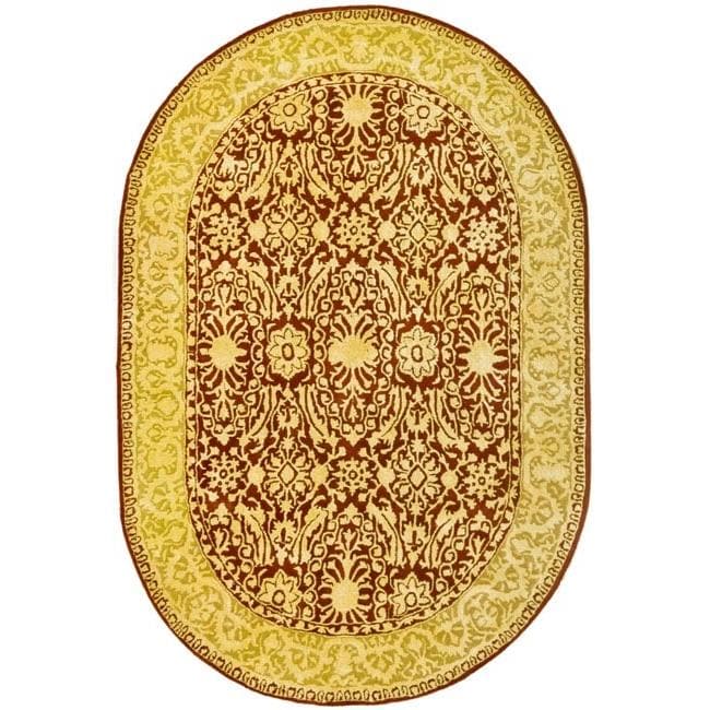 Handmade Majestic Maroon/ Ivory N. Z. Wool Rug (46 X 66 Oval)