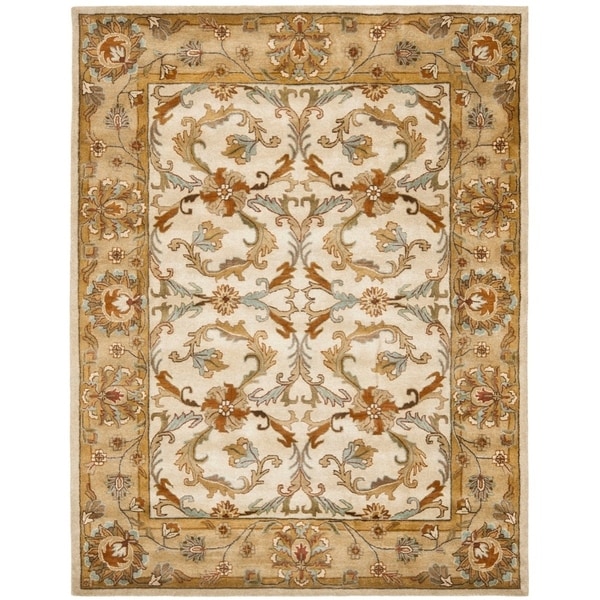 Safavieh Handmade Heritage Timeless Traditional Beige/ Gold Wool Rug - 7'6" x 9'6"