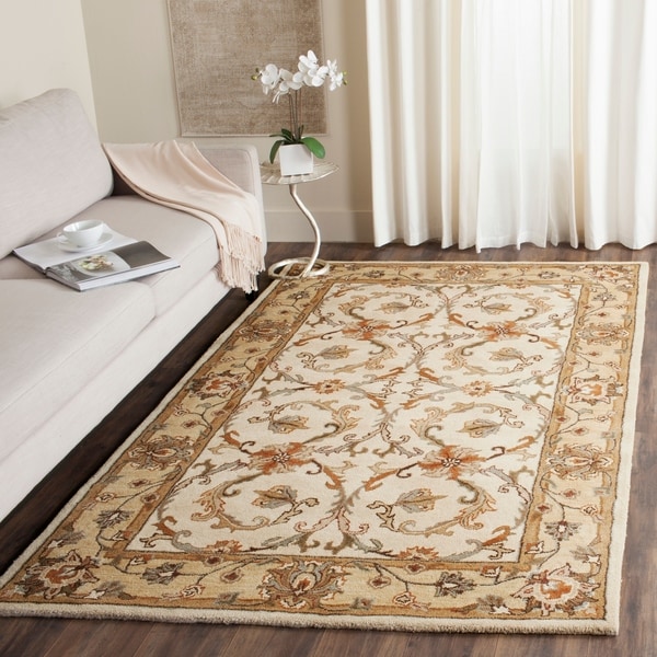 Safavieh Handmade Heritage Timeless Traditional Beige/ Gold Wool Rug - 7'6 x 9'6