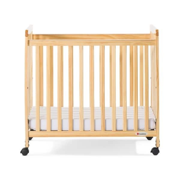 slide 2 of 4, Foundations® Safetycraft® Fixed-Side Compact Baby Crib, Slatted-Natural