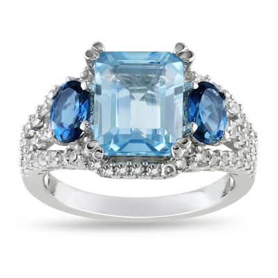 Miadora Sterling Silver Topaz and Created Sapphire 3-stone Halo Cocktail Ring