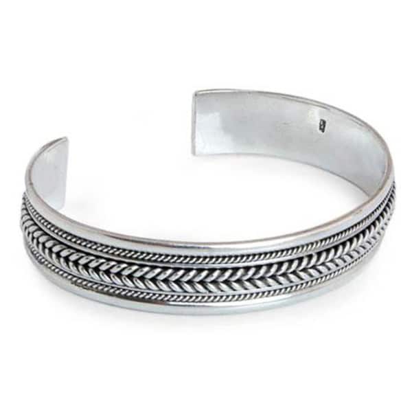 Lanna Illusions Braid Patterns Coil Around the Wrist in this 925 Sterling Silver Contemporary Womens Cuff Bracelet (Thailand). Opens flyout.