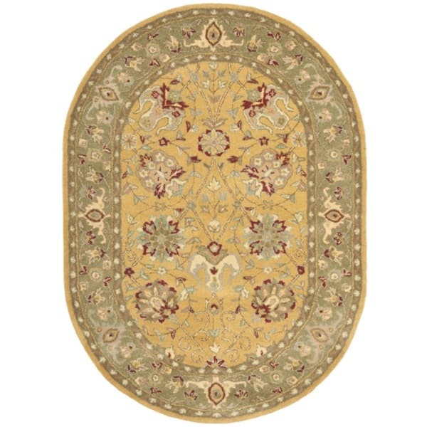 SAFAVIEH Handmade Antiquity Mazie Traditional Oriental Wool Rug - 4'6" x 6'6" Oval - Gold