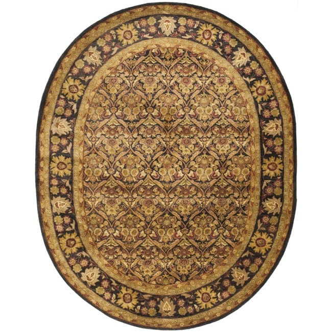 Handmade Treasured Dark Plum/ Gold Wool Rug (46 X 66 Oval)