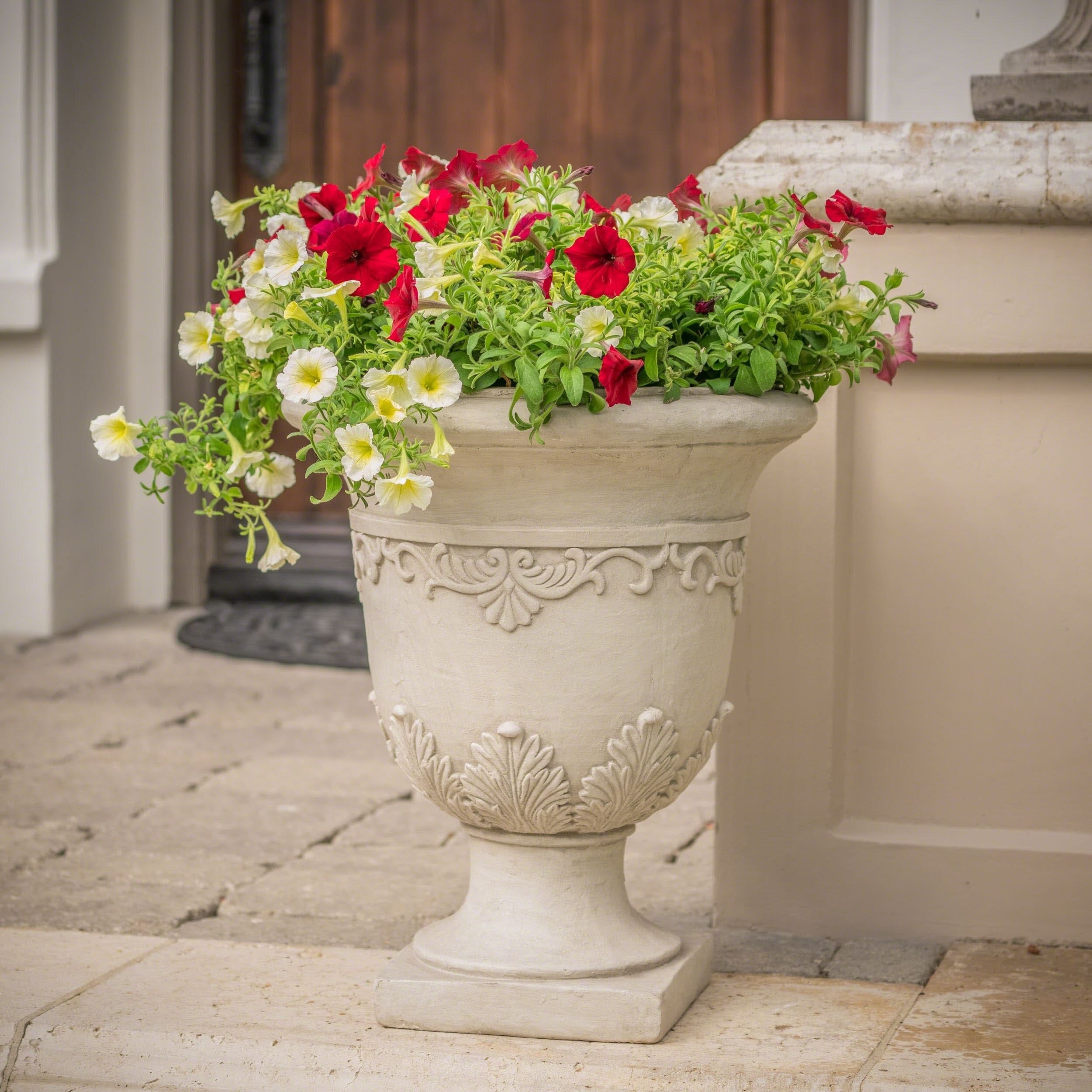 Christopher Knight Home Antique Moroccan 20 inch Urn Planter (Antique WhiteSturdy constructionNeutral colors to match any outdoor decorIdeal for just decoration or for decorative plants Dimensions 20.3 inches high x 16.75 inches wide x 16.75 inches deep 