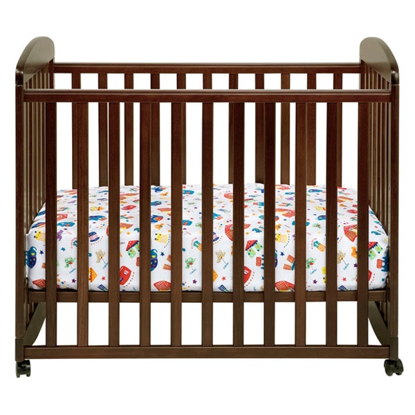 Alpha mini rocking outlet crib