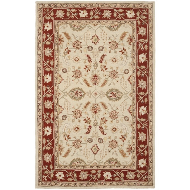 Hand hooked Oushak Ivory/ Rust Wool Rug (89 X 119)