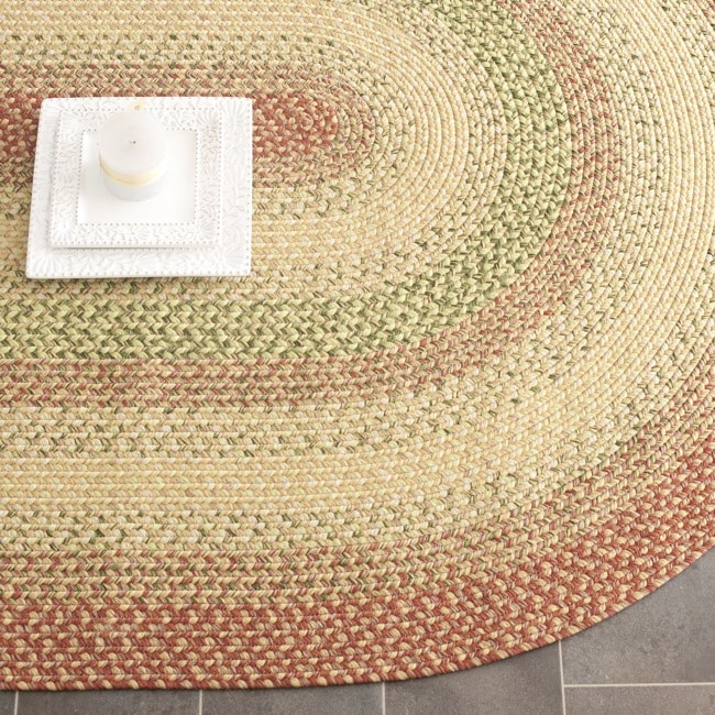 Hand woven Reversible Rust/ Ivory Braided Rug (6 X 9 Oval)