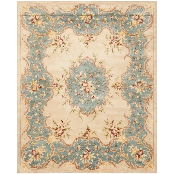 Safavieh Handmade Ivory/ Light Blue Hand-spun Wool Rug - 9' x 12'