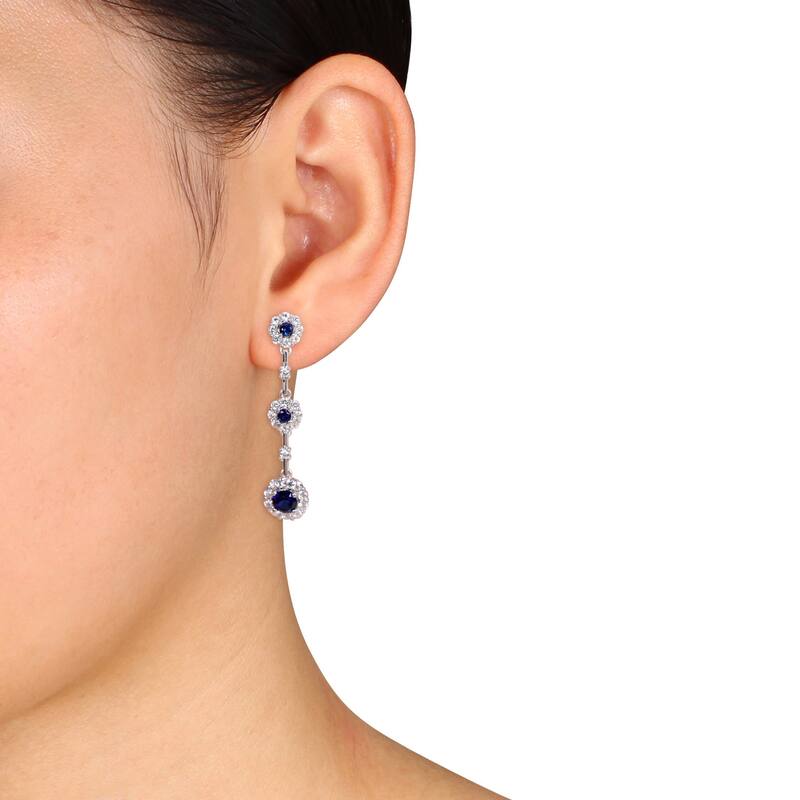 Miadora Sterling Silver Blue and White Sapphire Flower Birthstone Graduated Drop Earrings