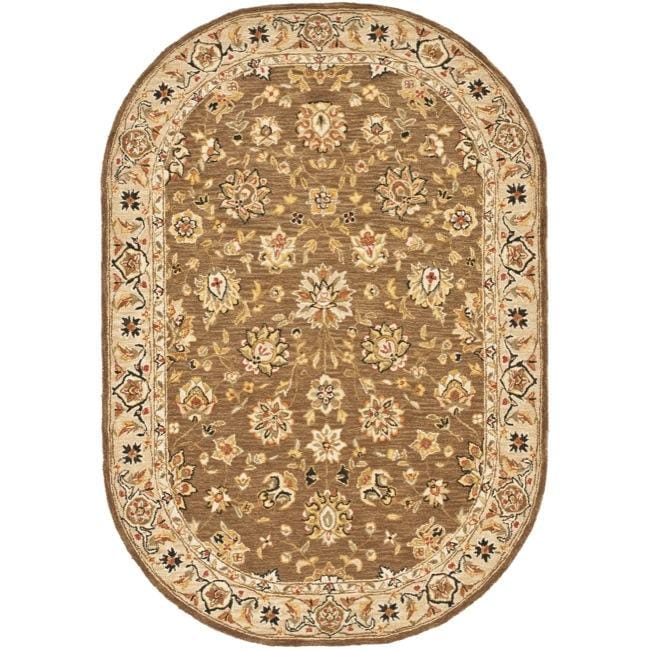 Mirco Hand hooked Chelsea Kerman Brown Wool Rug (46 X 66 Oval)