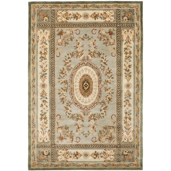 Safavieh Handmade Oasis Light Blue/ Ivory Hand-spun Wool Rug - 9' x 12'