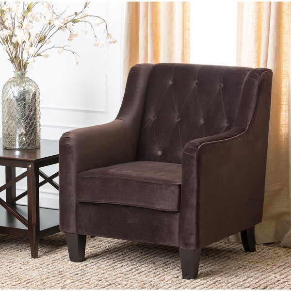 dark brown fabric armchair