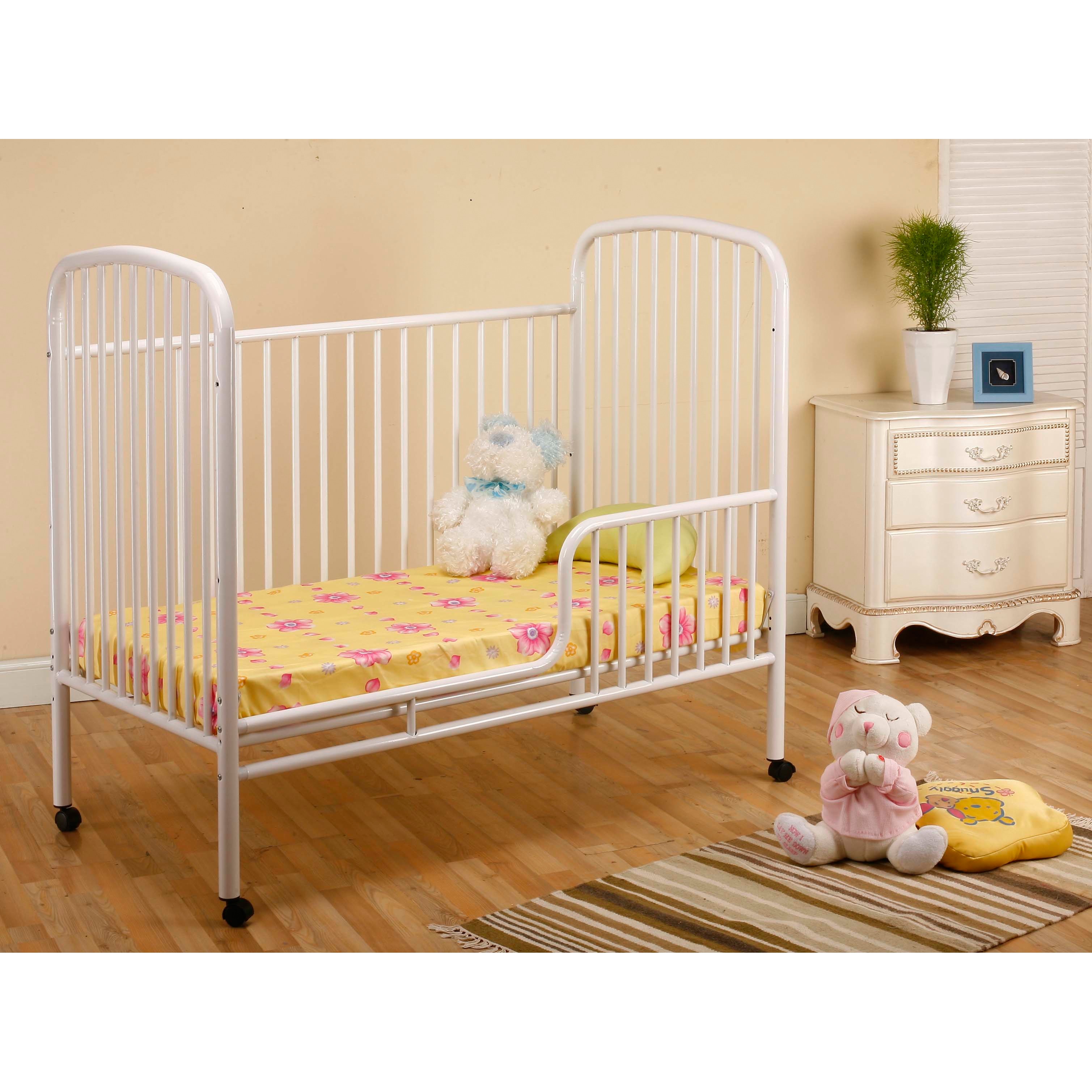 white metal convertible crib