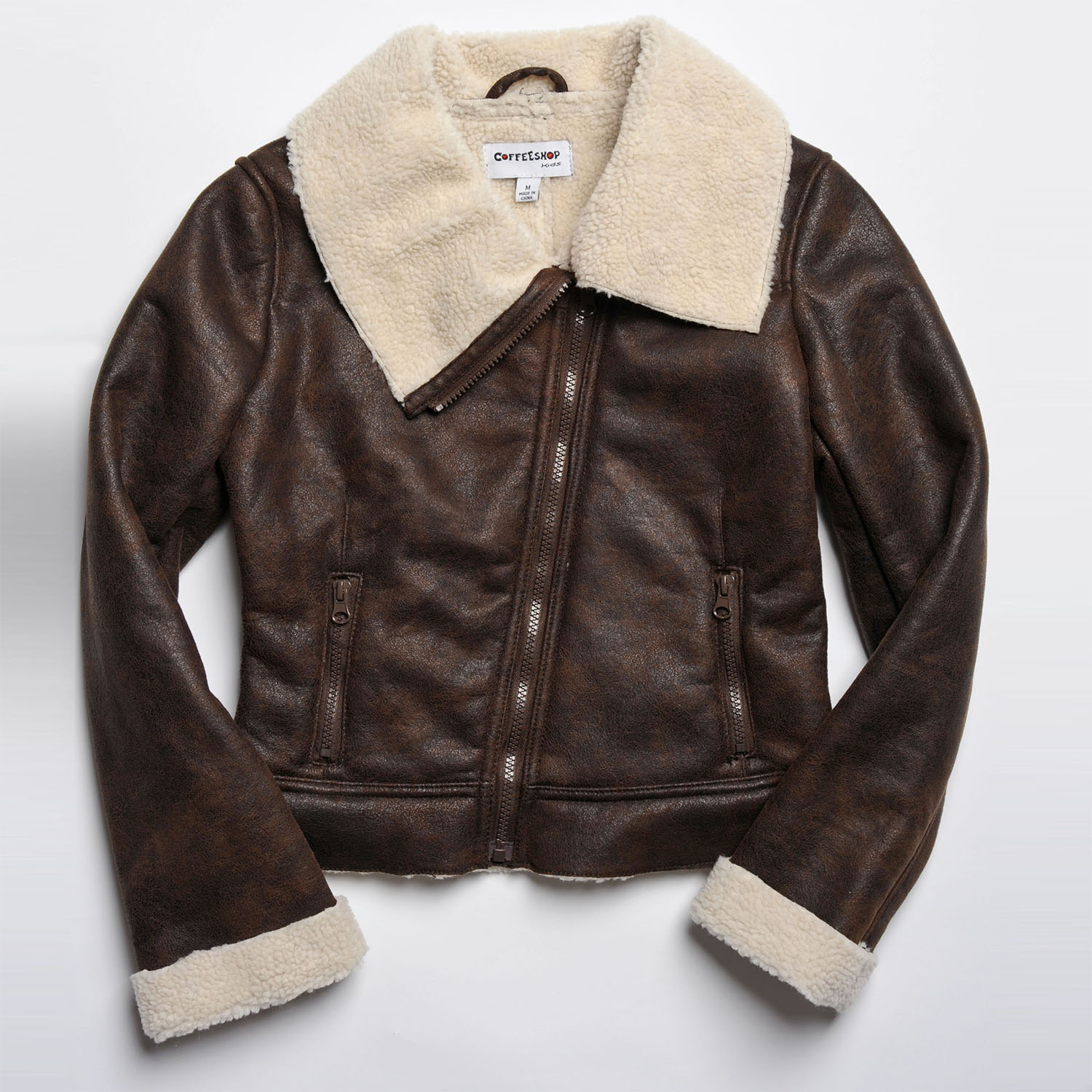 Coffeeshop Kids Girls Brown Faux Shearling Jacket (BrownFaux shearlingTwo (2) front zipper pocketsSpread collarLong sleeves with faux fur cuffsAsymmetrical front zipperZip up closureMeasurement Guide Childs Sizing GuideMaterials 70 percent acrylic/ 30 pe