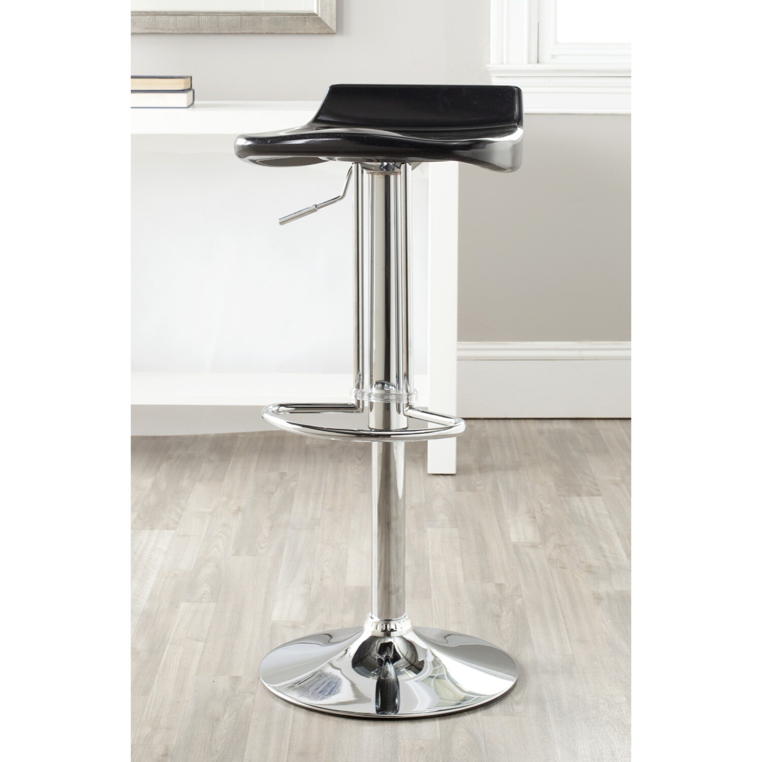 Safavieh Avish Black Adjustable Height Swivel Bar Stool (BlackMaterials ABS Plastic and Chrome SteelSeat dimensions 15.2 inches wide x inches deepSeat height 23.6 32.1 inchesDimensions 25.6 34.1 inches high x 15.2 inches wide x 16.3 inches deepThis pr