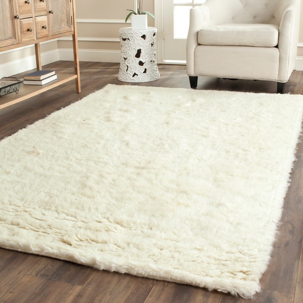 Safavieh Handmade Flokati Ivory Wool Rug 5 X 8 On Safavieh Handmade Flokati Ivory Wool Rug