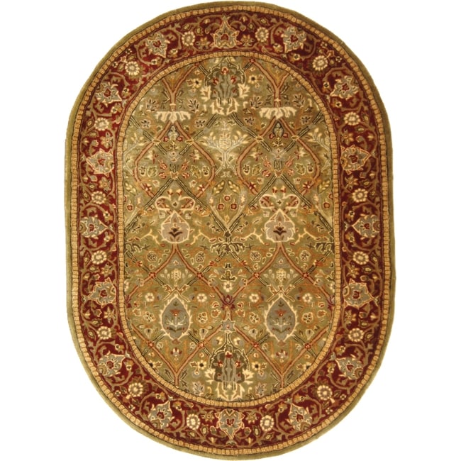 Handmade Persian Legend Light Green/ Rust Wool Rug (76 X 96)