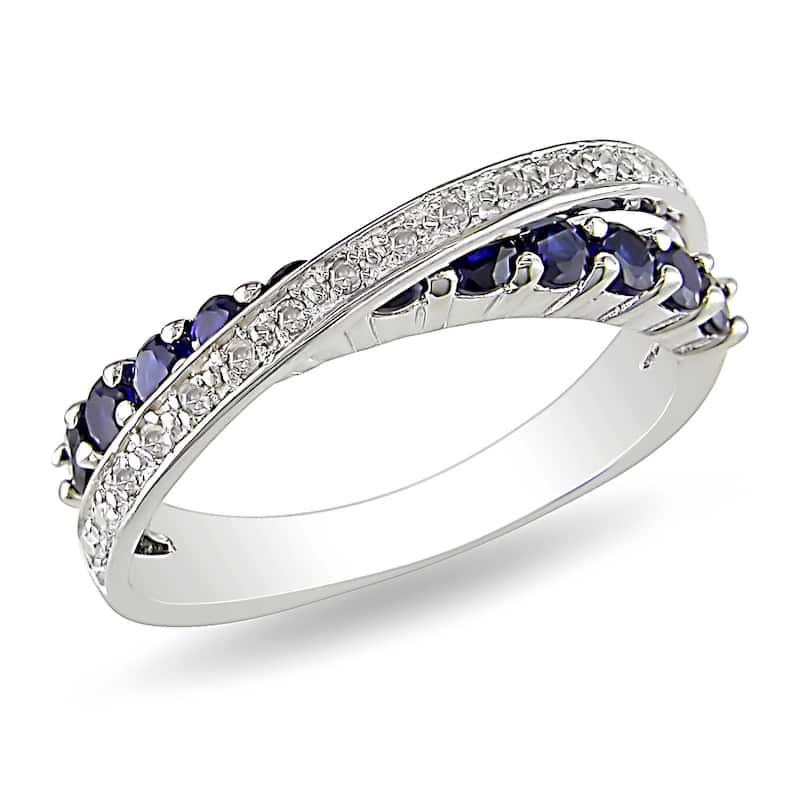 Miadora Sterling Silver Blue Sapphire and 1/10ct TDW Diamond Crossover Ring