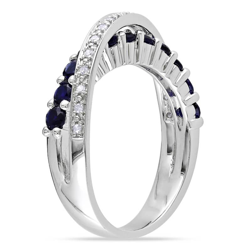 Miadora Sterling Silver Blue Sapphire and 1/10ct TDW Diamond Crossover Ring