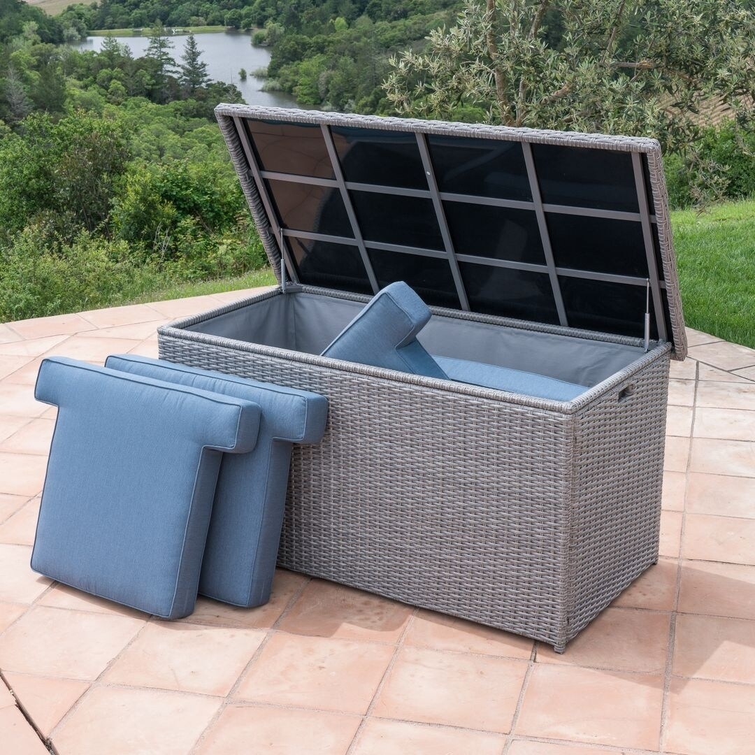 Outdoor Cushion Storage Seat Box (BrownMaterials Aluminum, resin wicker, waterproof lining, hydraulic stabilizer rods for lidFinish Weather resistant resin wickerCushions included NoWeather resistant Yes, weather resistant wicker, waterproof inner lin