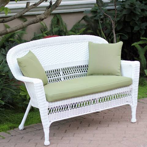 White Wicker Loveseat With Cushion and Pillows