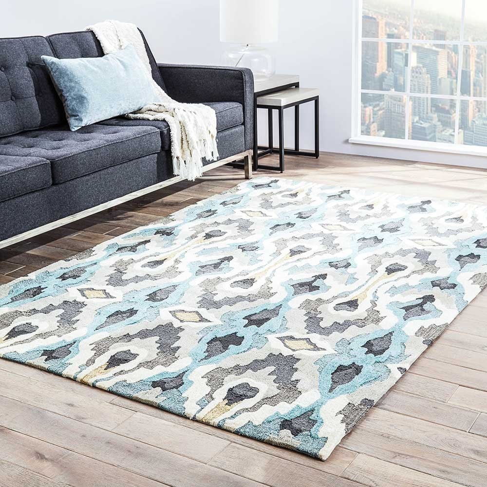 Hand tufted Transitional Tribal Pattern Blue Rug (76 X 96)