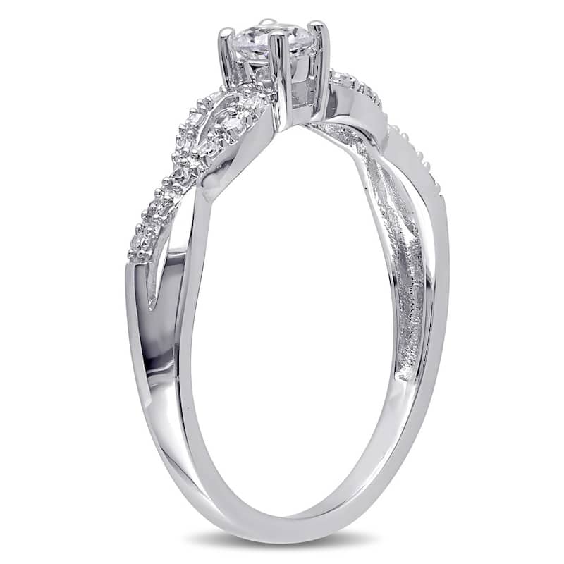 Miadora Sterling Silver Created White Sapphire and 1/10ct TDW Diamond Infinity Promise Ring