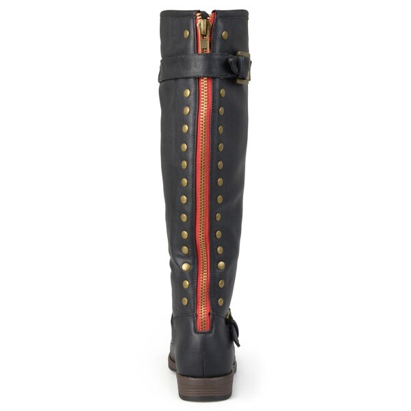 riding boots with red zipper