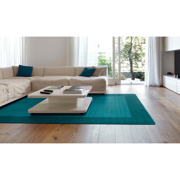 Borders Hand-Tufted Turquoise Wool Rug - 5' x 7'9