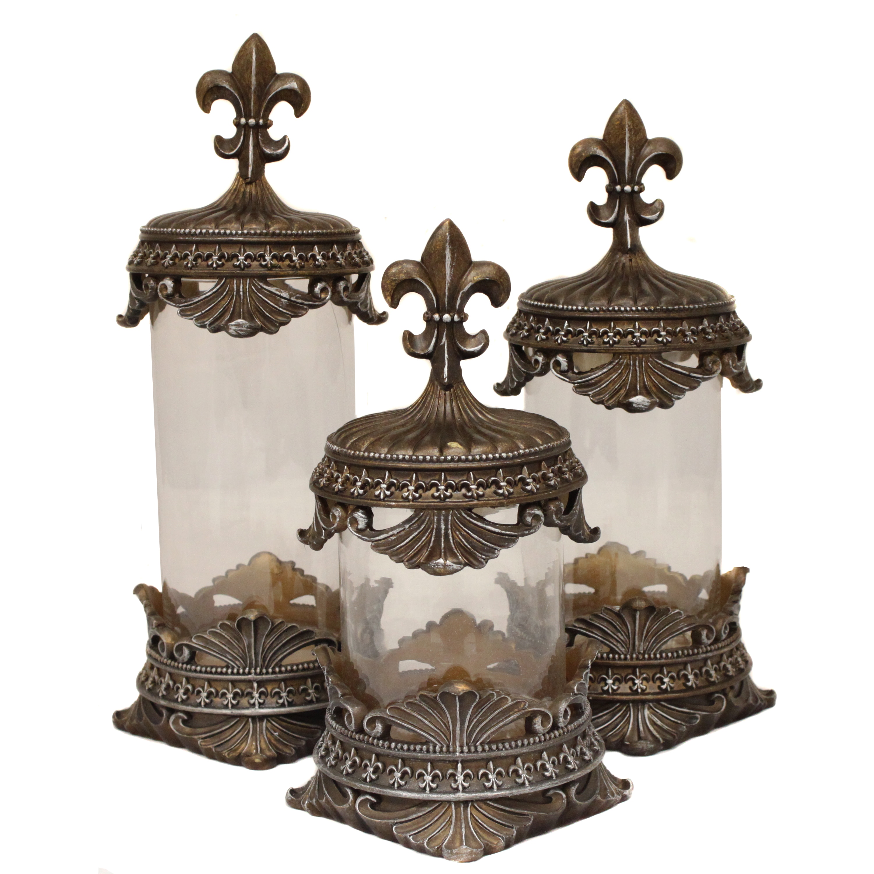 Casa Cortes Decorative Glass Canister (set Of 3) (BronzeQuantity Set of three (3)Lids feature a beautiful fleur de lis lids designLarge piece dimensions 17 inches high x 6 inches wide x 6 inches longMedium piece dimensions 15 inches high x 6 inches wid