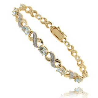Dolce Giavonna 14k Gold Overlay Blue Topaz and Diamond \u0027XOXO\u0027 Bracelet