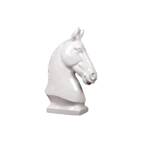 white ceramic horse statue