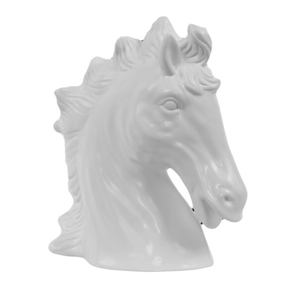 white ceramic horse statue